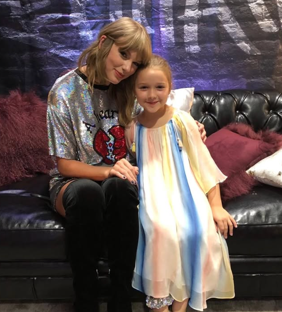 A photo of Taylor Swift and Harper Beckham