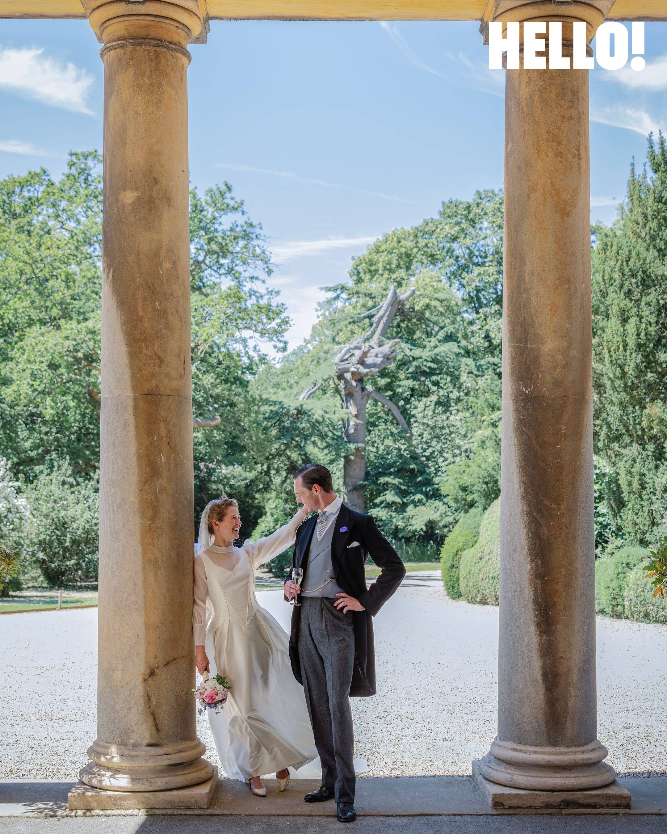 Madeleine and George in the portico of Prestwold Hall