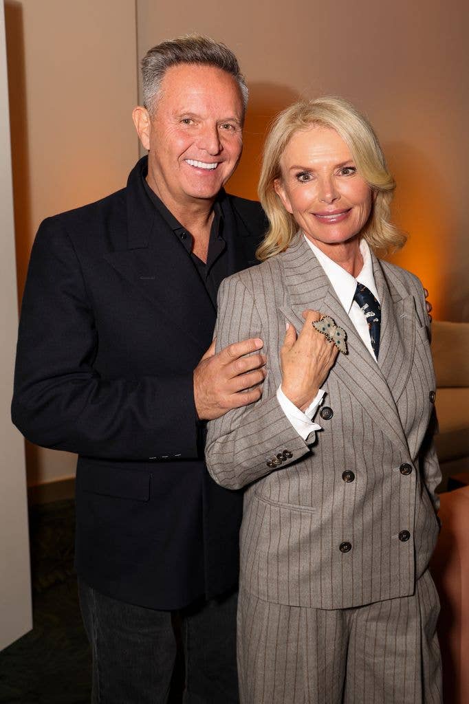 photo of roma downey and mark burnett in suits