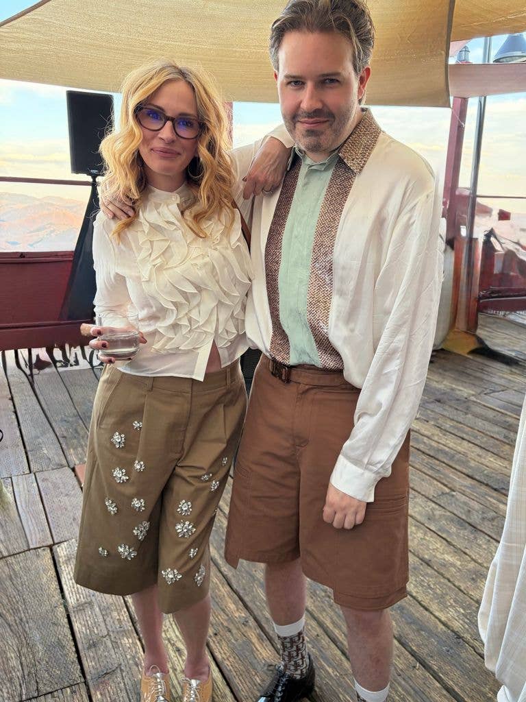Julia Roberts and Michael Braun pose for a photo during a party from Emma Roberts' wedding celebration, shared on Instagram