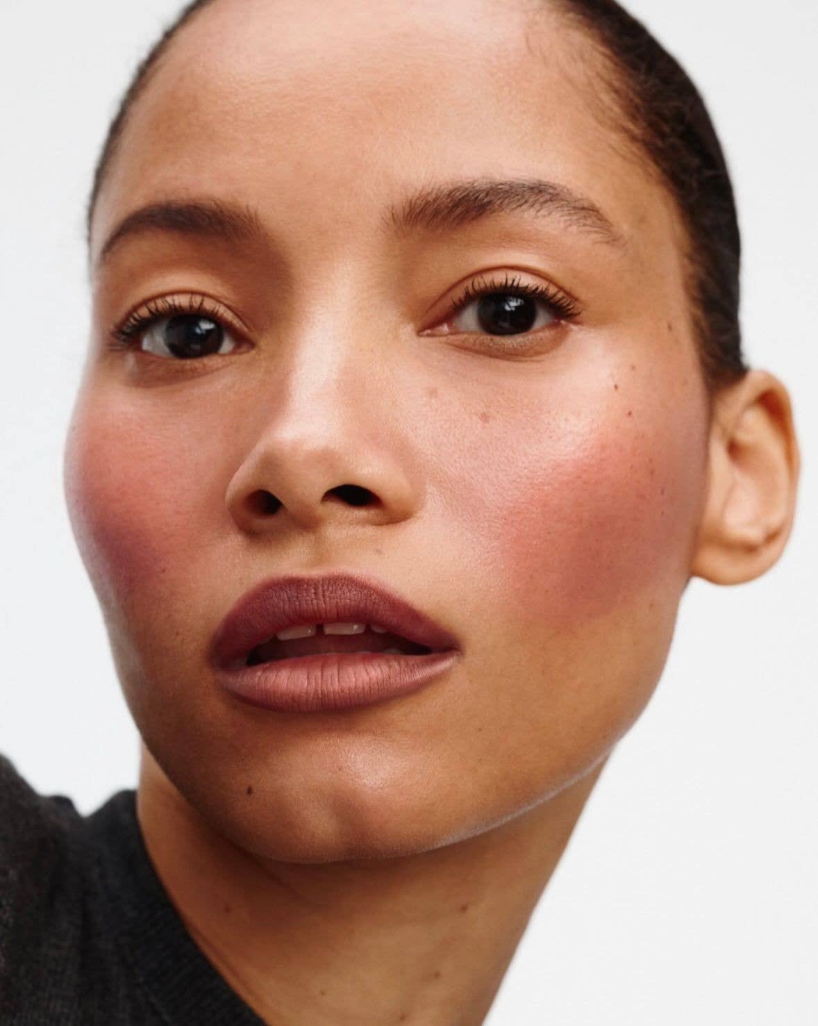 woman with cream makeup on 