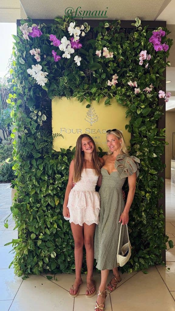 Ali Larter in stripe dress and her daughter Vivenne