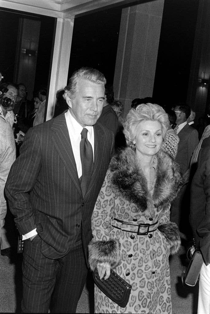 John Forsythe (L) and Julie Warren attend a party in downtown Los Angeles after the opening of 'Juno and the Paycock' at the Mark Taper Forum on November 8, 1974. 