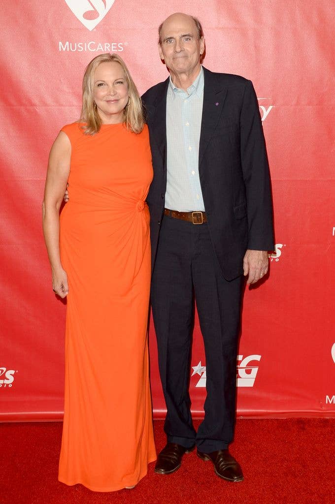 Singer James Taylor (R) and Kim Taylor attend The 2014 MusiCares Person Of The Year Gala Honoring Carole King at Los Angeles Convention Center on January 24, 2014 in Los Angeles, California.
