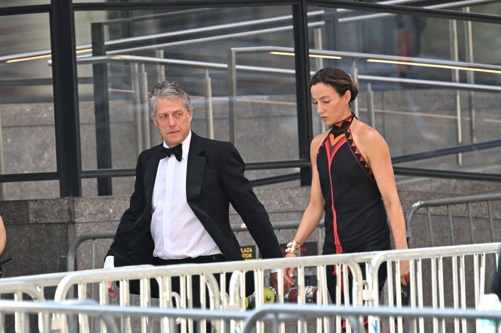 photo of hugh grant in tux taylor swift wedding