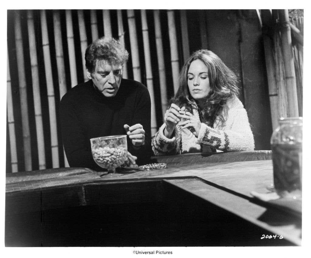 Catherine stars with Burt Lancaster in " The Midnight Man" 