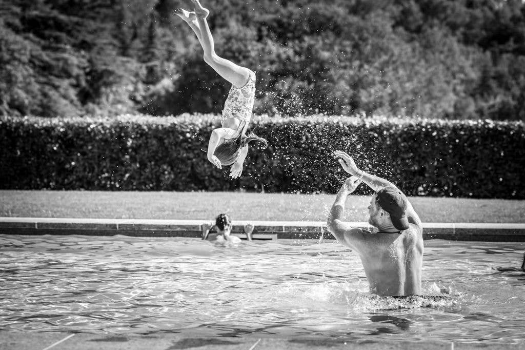 Other photographs included Lilibet jumping in the pool