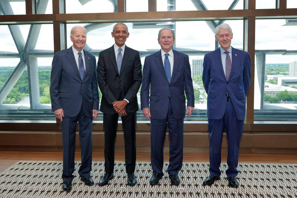(L-R) Former President Joe Biden, former President Barack Obama, former President George W. Bush, and former President Bill Clinton pose together in 2026