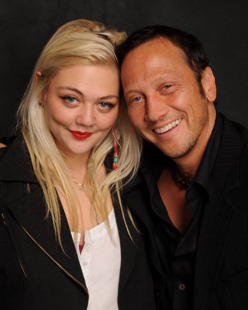 Musician Elle King (L) and her father, comedian Rob Schneider pose at The Ice House Comedy Club on October 15, 2009 in Pasadena, California.