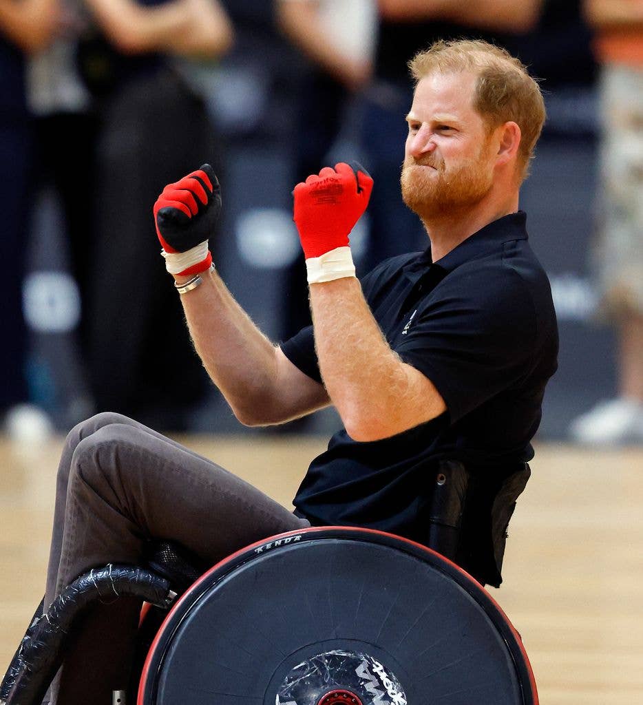 prince harry celebrating in wheelchair