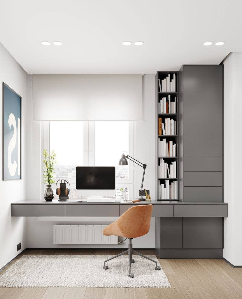 Modern office with desk, chair, computer, bookshelf, and large window.
