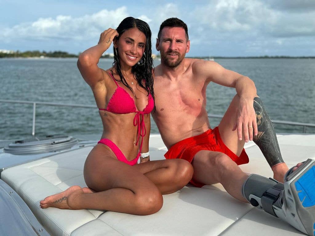 Antonela in pink bikini and messi topless