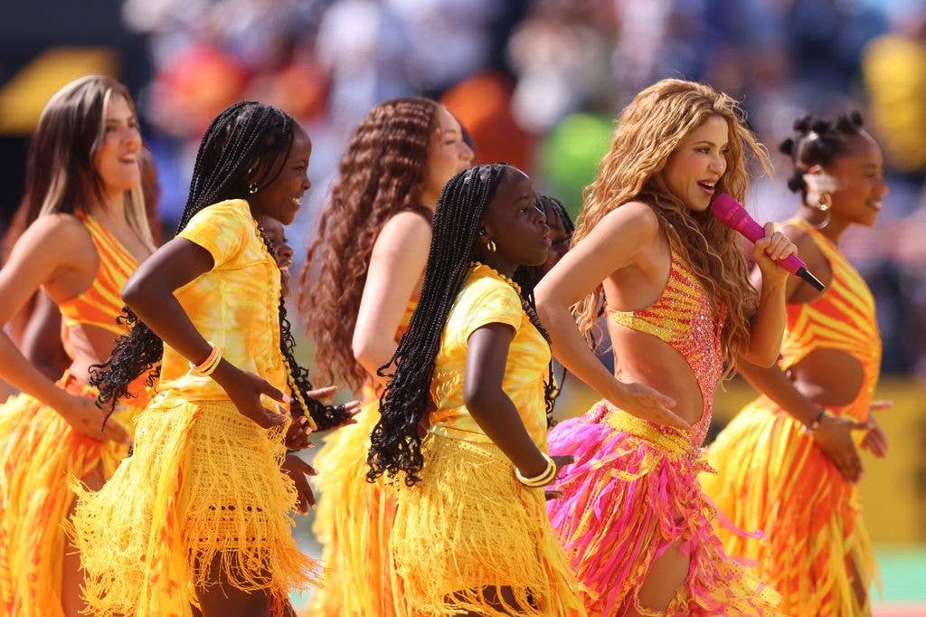Shakira with her dancers