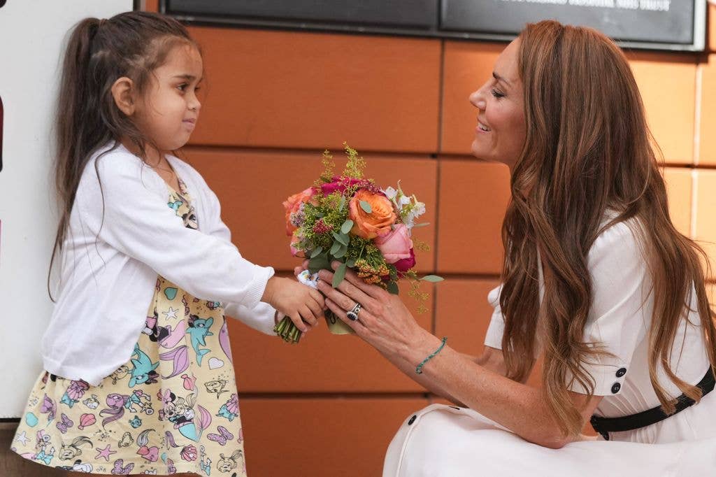 The Princess of Wales receives flowers from 5-year-old Amelie 