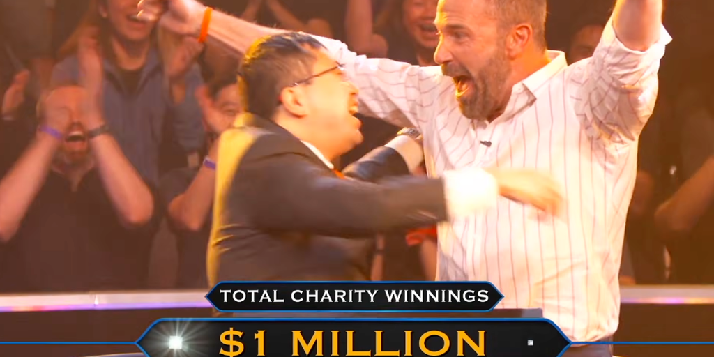 Ben and Jamie celebrating on Who Wants To Be A Millionaire.