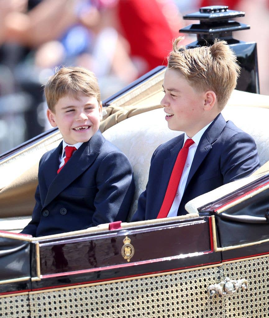 Prince George and Prince Louis travel by carriage during Trooping The Colour