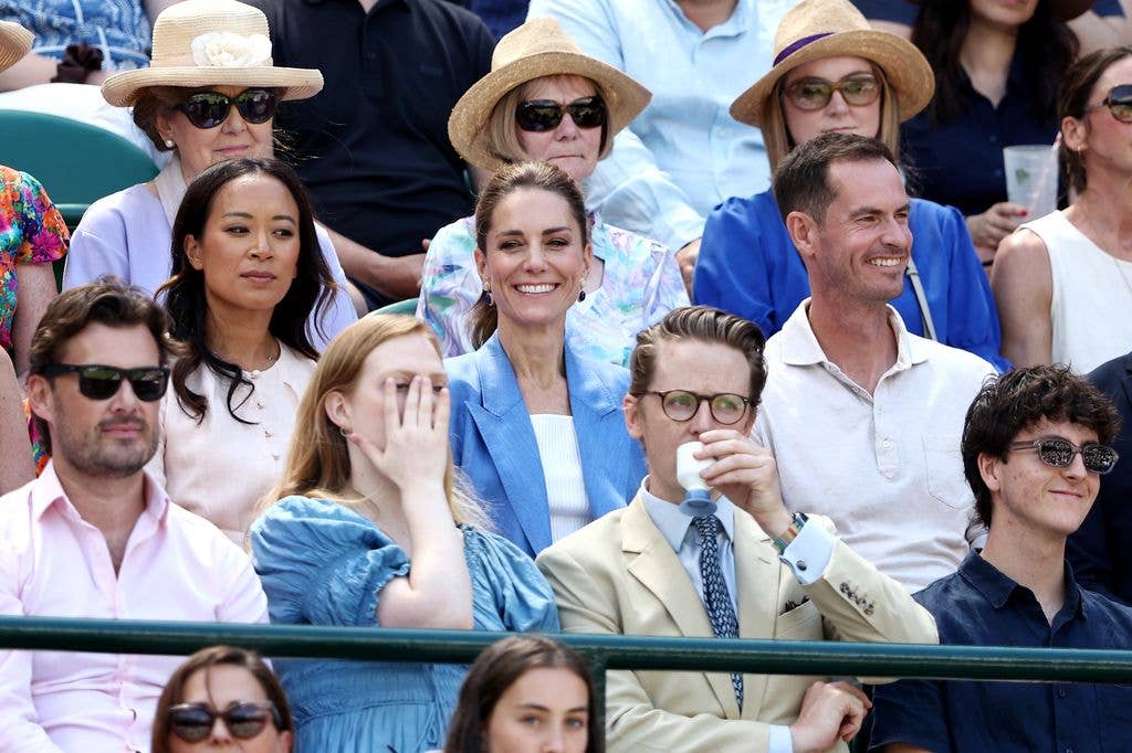 The Princess of Wales attends the Ladies' Singles second round match between Katie Swan and Madison Keys alongside Andy Murray