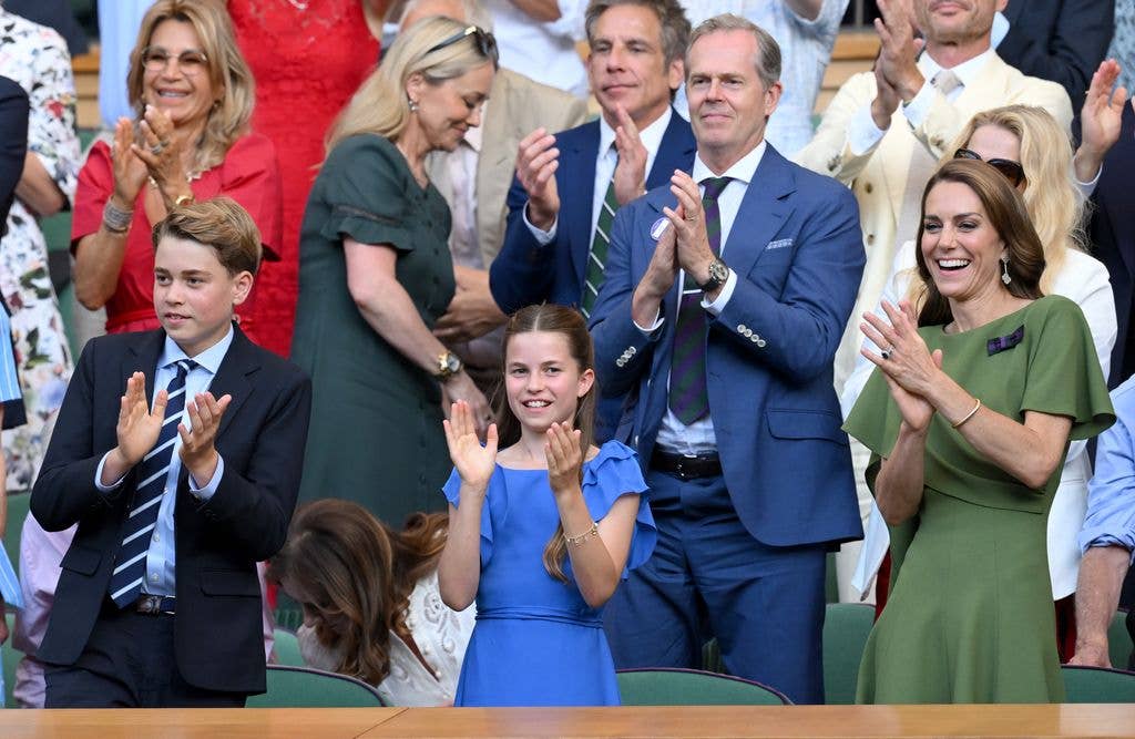 Prince George, Princess Charlotte and Princess Kate clap as they attend day fourteen of the 2026 Wimbledon Tennis Championships
