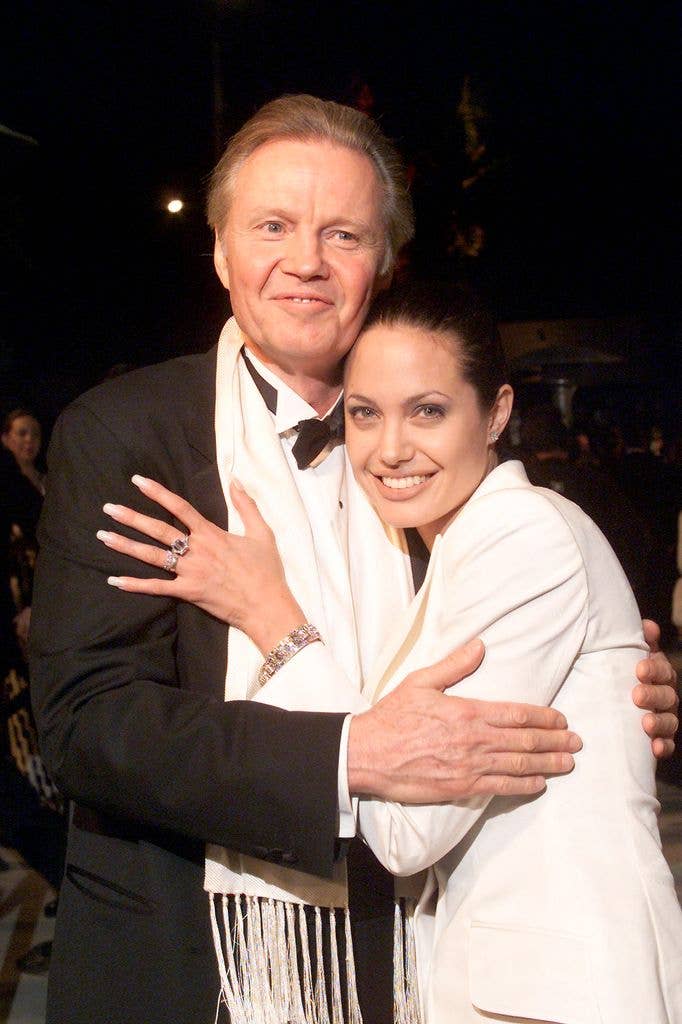 Angelina Jolie with her father Jon Voight at the Vanity Fair Oscar party at Morton's in Beverly Hills, Los Angeles, CA. 03/25/2001.