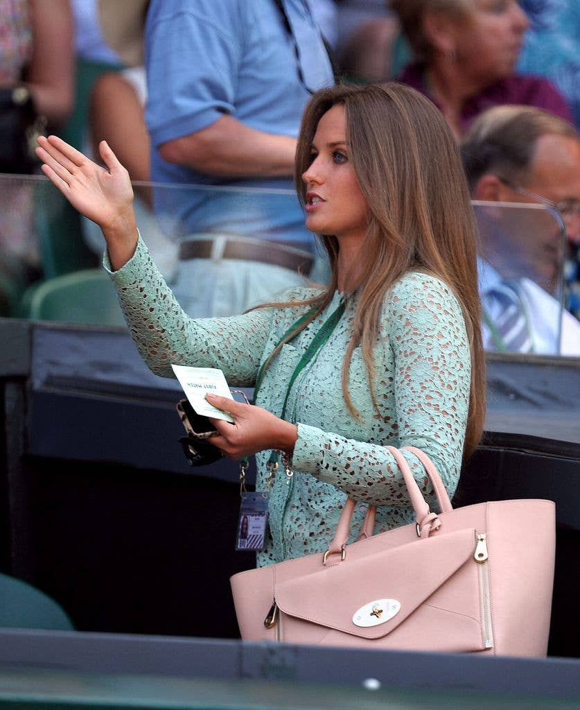 Kim accessorised with a nude Mulberry bag