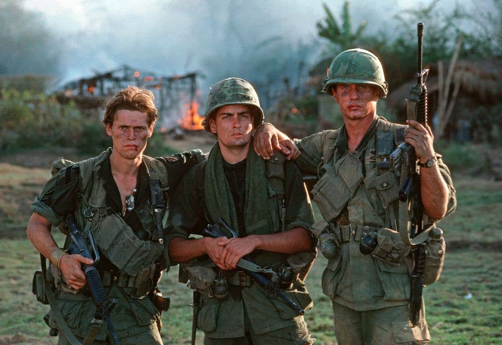 During the filming of Oliver Stone's Platoon at a location near Manila, actors Willem Dafoe, Charlie Sheen and Tom Berenger 