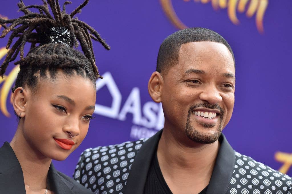 Willow Smith and Will Smith attend the premiere of Disney's "Aladdin" on May 21, 2019 in Los Angeles, California. 