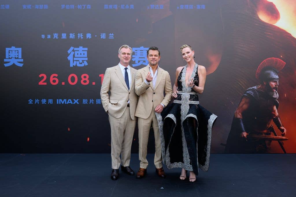 Director Christopher Nolan and Matt Damon joined Charlize on the red carpet