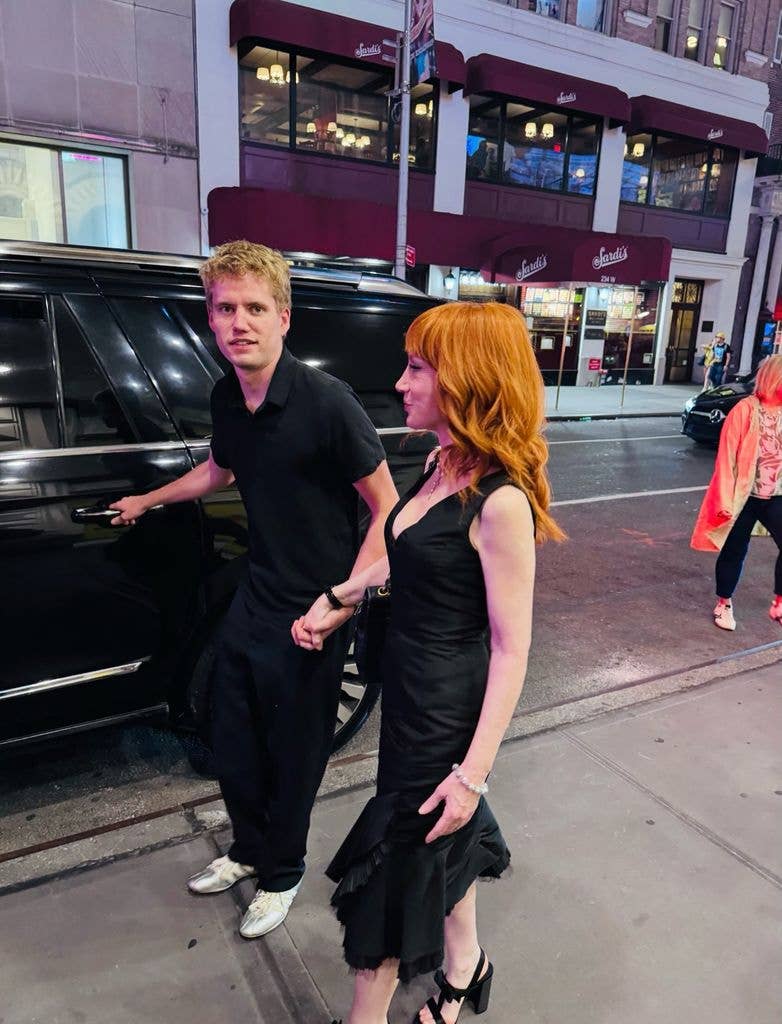 photo of kathy griffin holding hands with mystery younger man