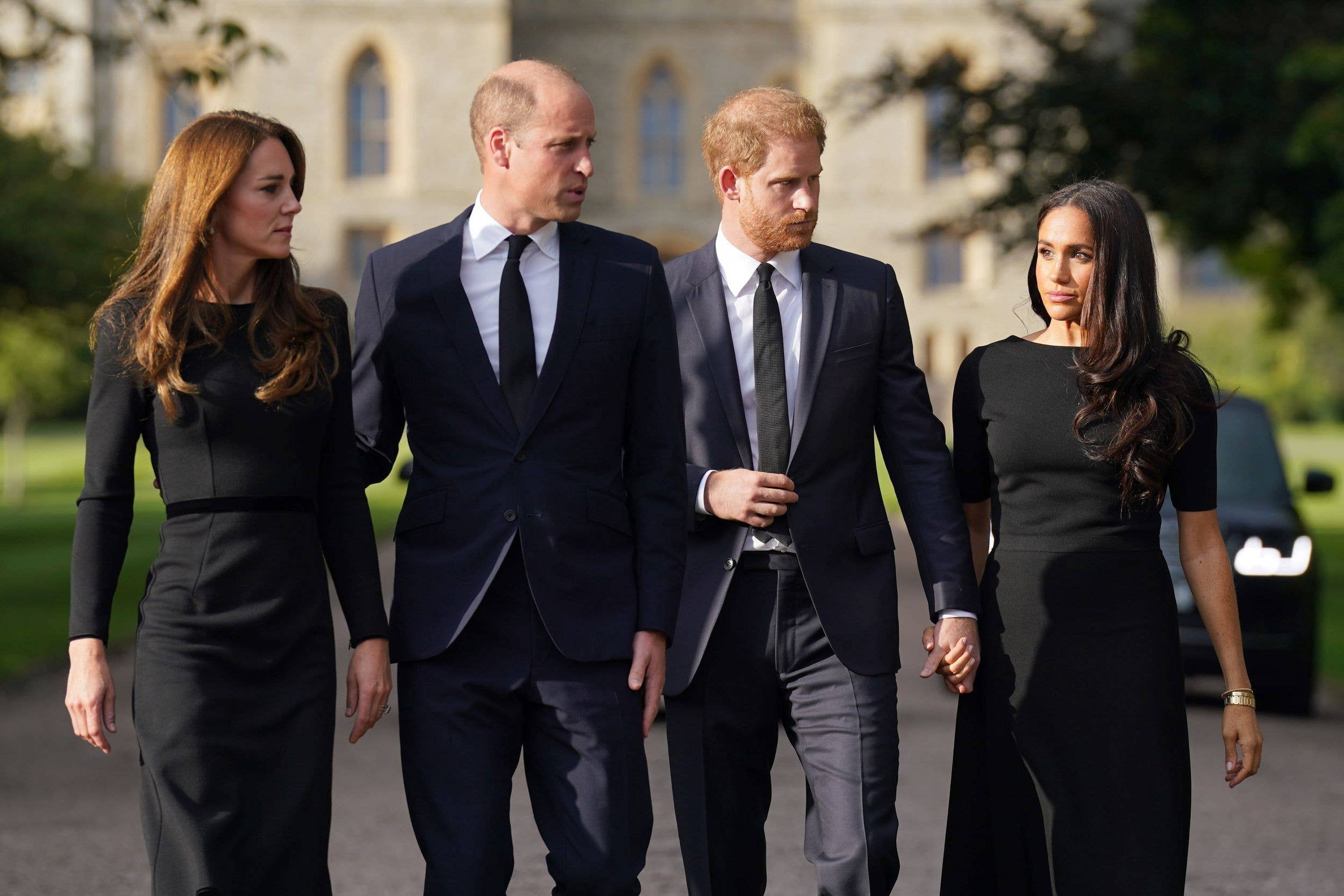 Catherine, Princess of Wales, Prince William, Prince of Wales, Prince Harry, Duke of Sussex, and Meghan, Duchess of Sussex on the long Walk at Windsor Castle on September 10, 2022 in Windsor, England. 