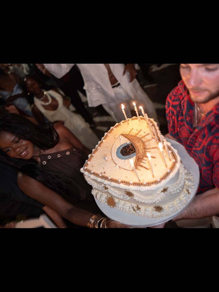Madonna's son Rocco Ritchie holds her cake while celebrating her 68th birthday in Greece with family, shared on Instagram