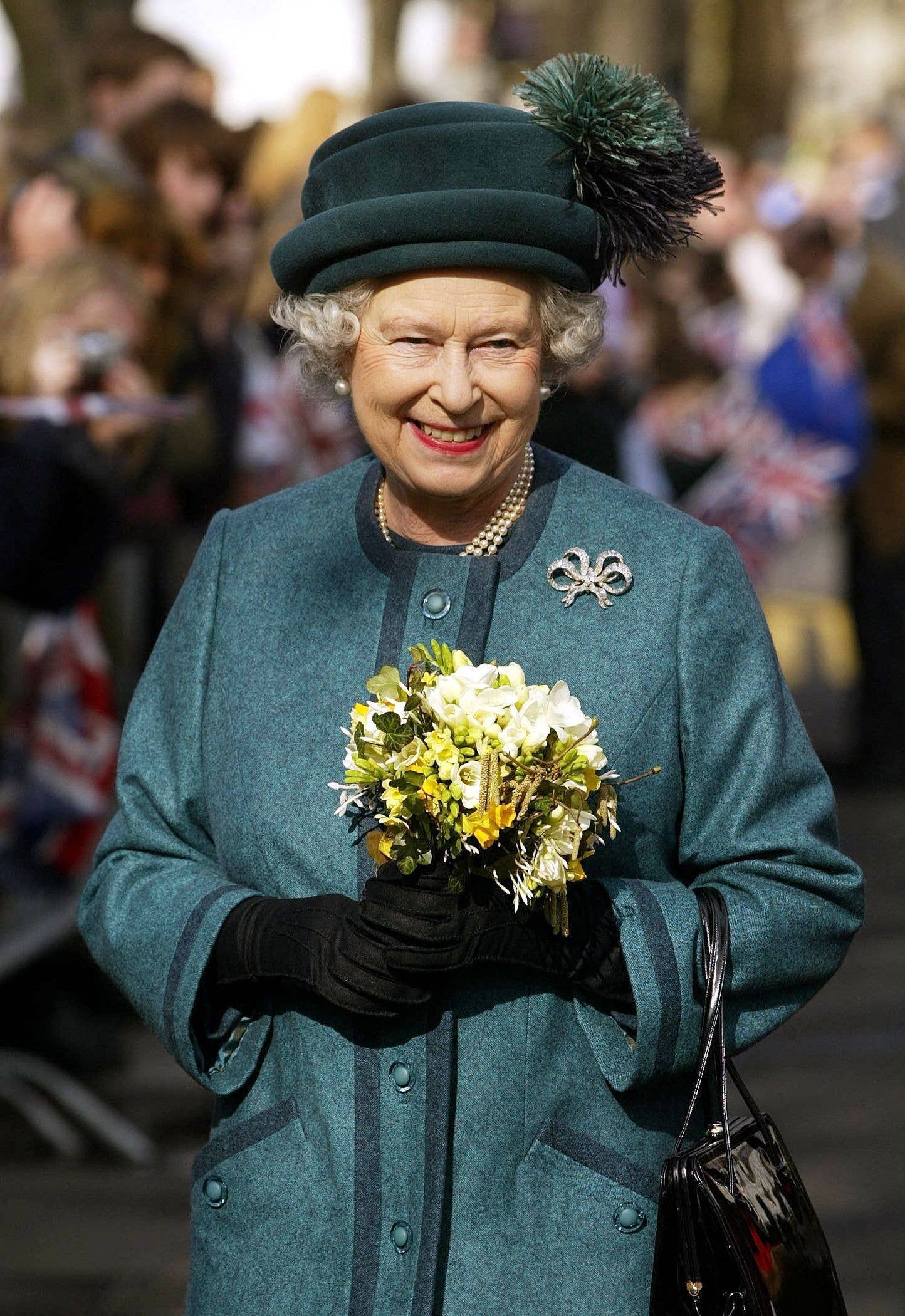 The late Queen pictured during a visit to our school in 2004