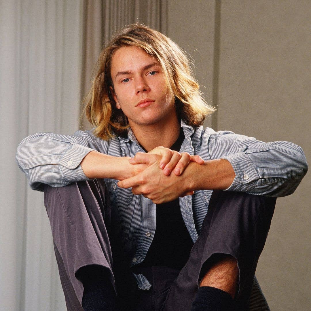 Actor River Phoenix, star of "Stand By Me," poses during a 1988 Los Angeles, California, photo portrait session. Phoenix, a rising young film star, tragically died in 1993 outside a Sunset Strip nightclub of a drug overdose.