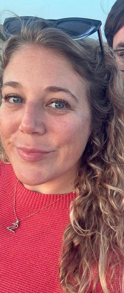 selfie of mel in a red jumper