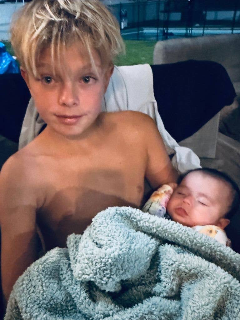 Photo shared by Josh Duhamel of his son Axl with one of his younger half-siblings, either Shepherd or Rocca