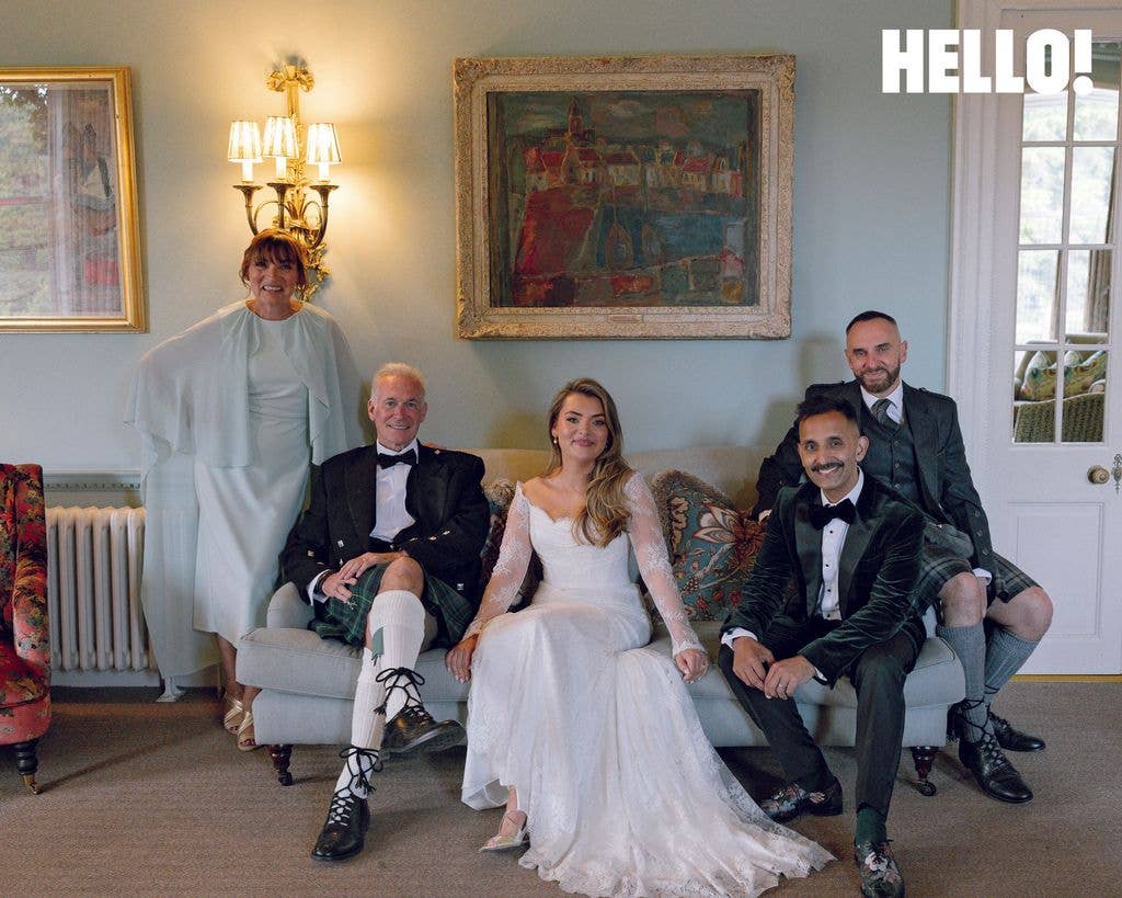 Rosie Kelly poses with her loved ones on her wedding day