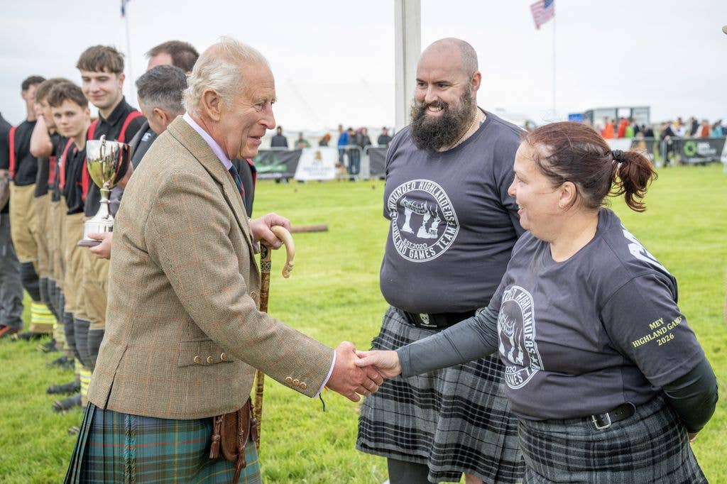 King Charles III speaks to members of The Wounded Highlanders team at the Mey Highland Games at the John O'Groats Showground in Caithness. Picture date: Saturday August 1, 2026. (Photo by Lesley Martin/PA Images via Getty Images)
