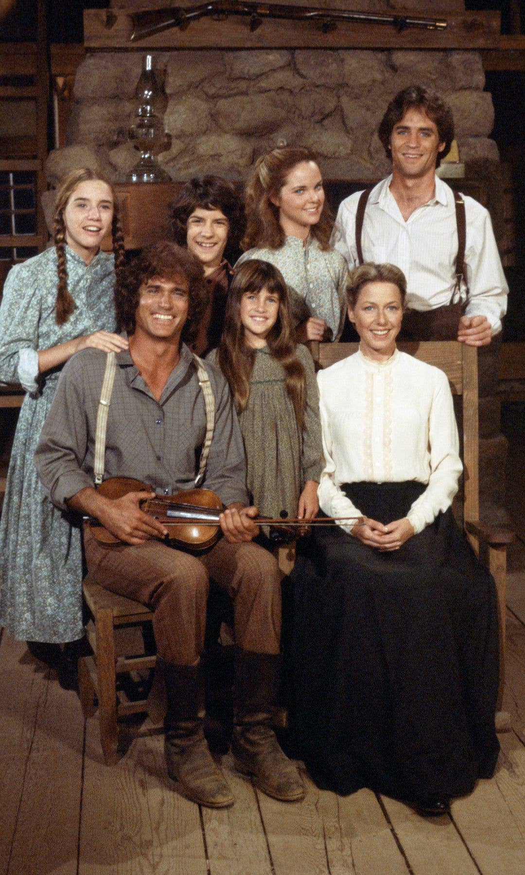 Group photo of Melissa Sue Anderson, Matthew Laborteaux, and other cast members from 'Little House on the Prairie' in period clothing.