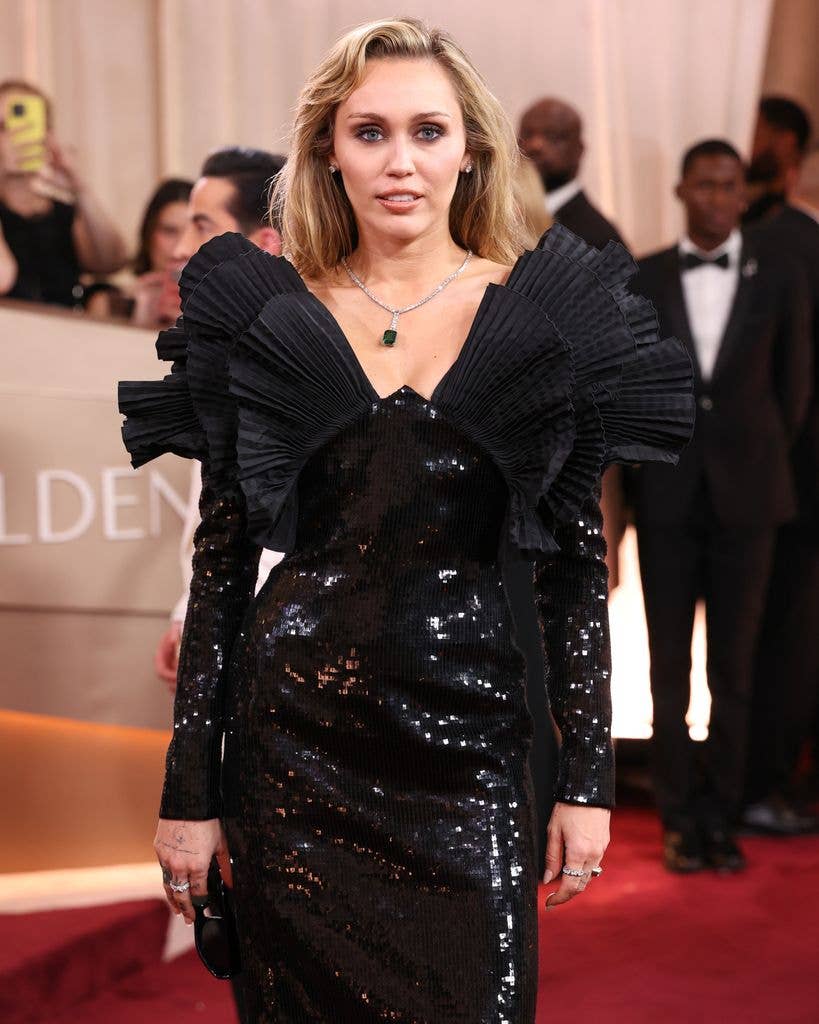 Miley Cyrus in black dress at the 83rd Annual Golden Globes held at The Beverly Hilton