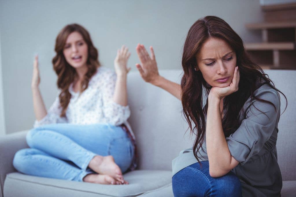 two woman arguing while seated on a sofa toxic 