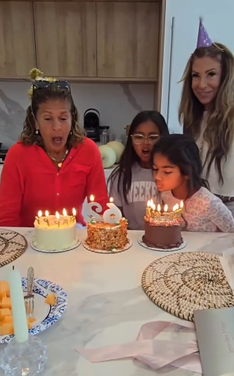 The trio blew out the cakes together