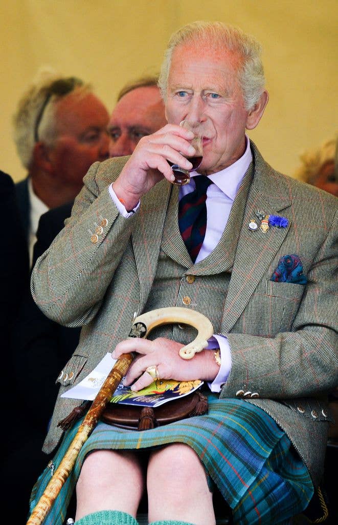 King Charles III in traditional Highland dress enjoys a dram during the 2026 Mey Highland Games at John O'Groats Showground on August 01, 2026 in John O'Groats, Scotland. (Photo by Martin Grimes/Getty Images)