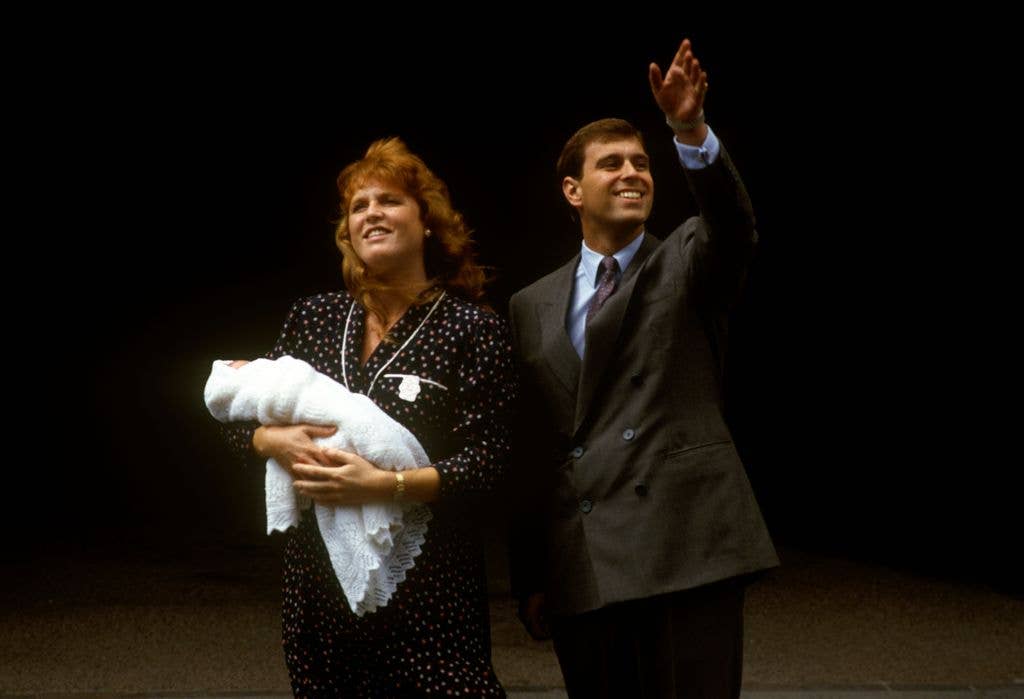 Prince Andrew, Duke of York waving, and Sarah, Duchess of York, leave Portland Hospital, London smiling holding their newborn daughter Princess Beatrice