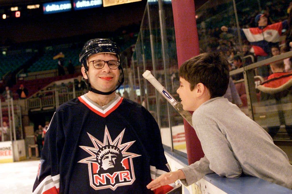 Actor Rick Moranis with his son at the Superskate 2001 charity hockey event at Madison Square Garden in New York City. 