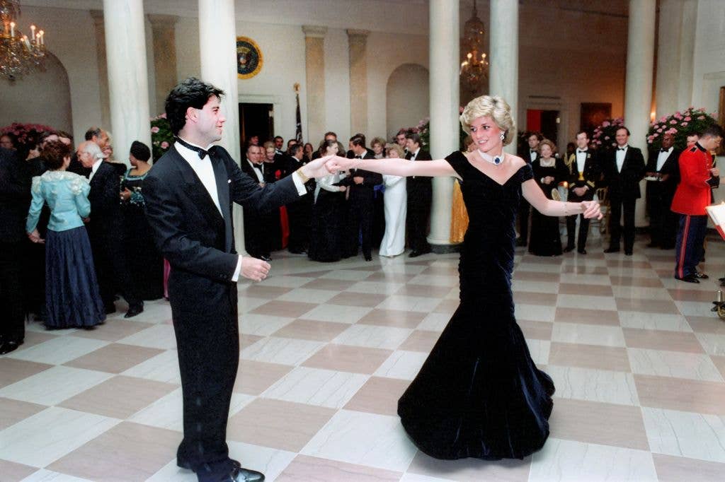 American actor John Travolta dancing with Princess Diana in Cross Hall of the White House, Washington, D.C., USA, President Ronald Reagan White House Photographic Office, November 9, 1985.