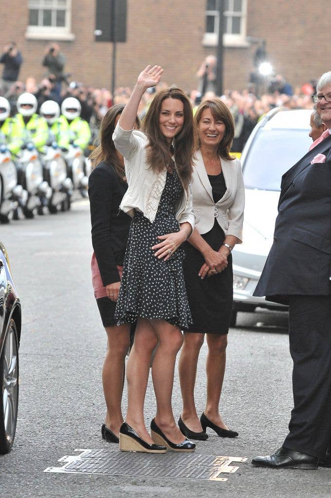 Catherine Middleton (M) is seen arriving with her mother Carole Middleton (R) and sister Pippa Middleton (L) at the Goring Hotel, where she will spend her last night as a single woman ahead of the Royal Wedding on April 28, 2011 in London, England.
