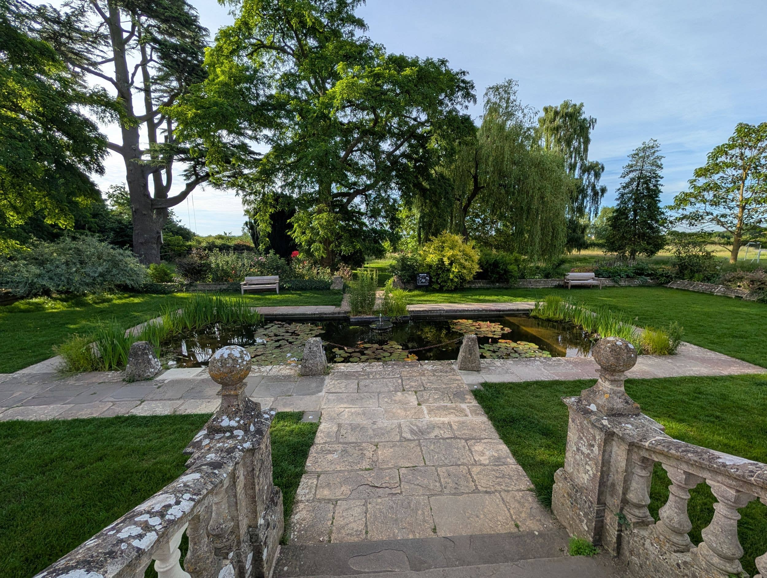 The pond at Woolley Grange which promises lush, green grounds, walled gardens and plenty of space