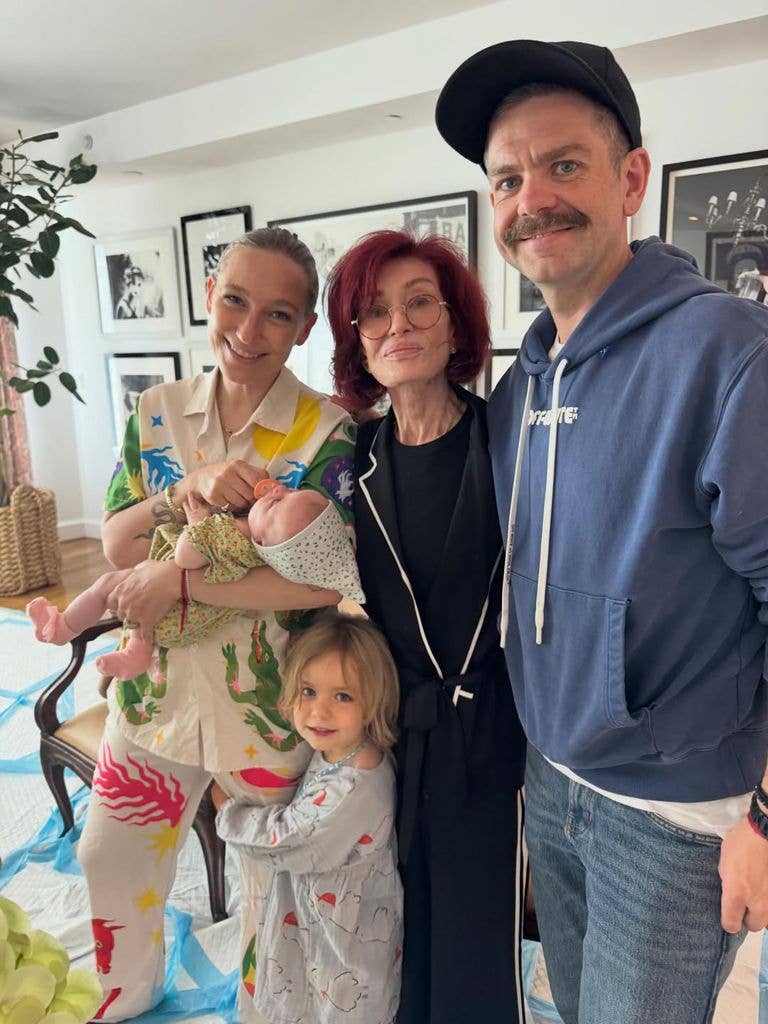 Jack Osbourne pictured recently with his family - wife Aree, mom Sharon Osbourne and daughters Maple and Ozzy
