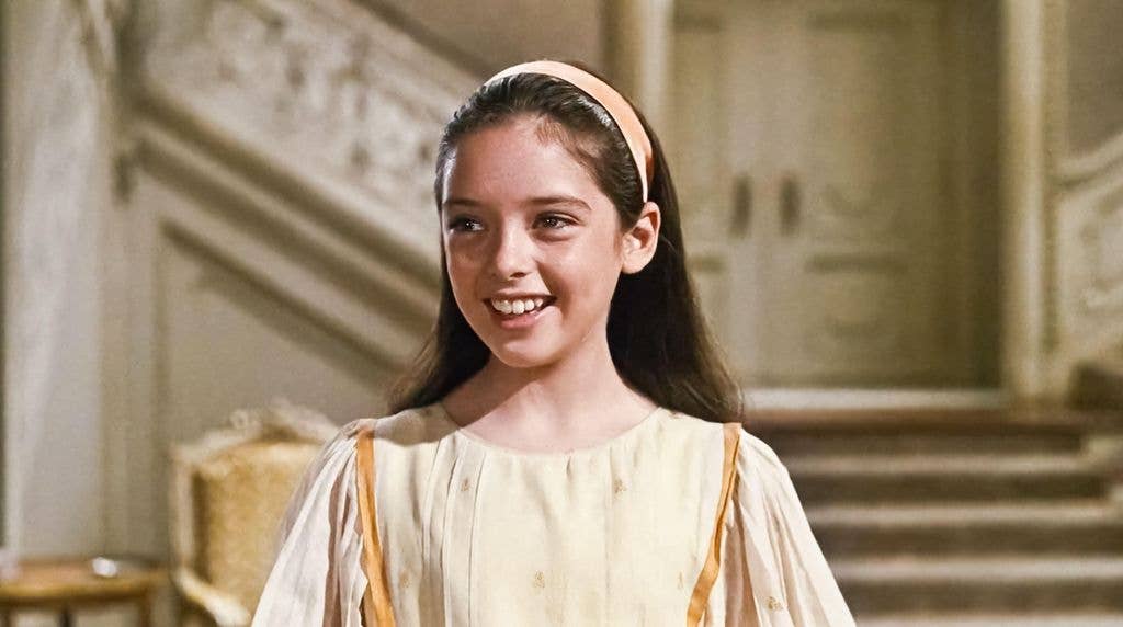 Angela Cartwright in a still image from The Sound of Music