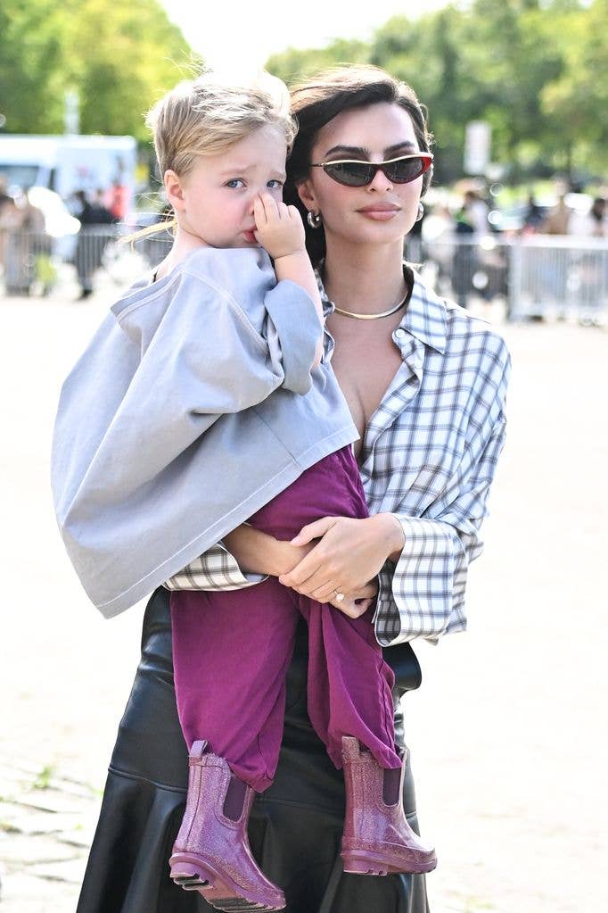 Emily Ratajkowski and Sylvester Apollo Bear attend the Loewe Paris Womenswear Spring-Summer 2025 show as part of Paris Fashion Week on September 27, 2024 in Paris, France. (Photo by Stephane Cardinale - Corbis/Corbis via Getty Images)