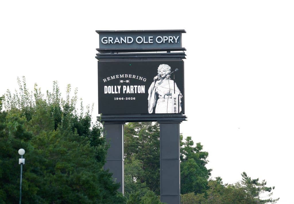 A memorial sign for Dolly Parton is seen at the Grand Ole Opry House